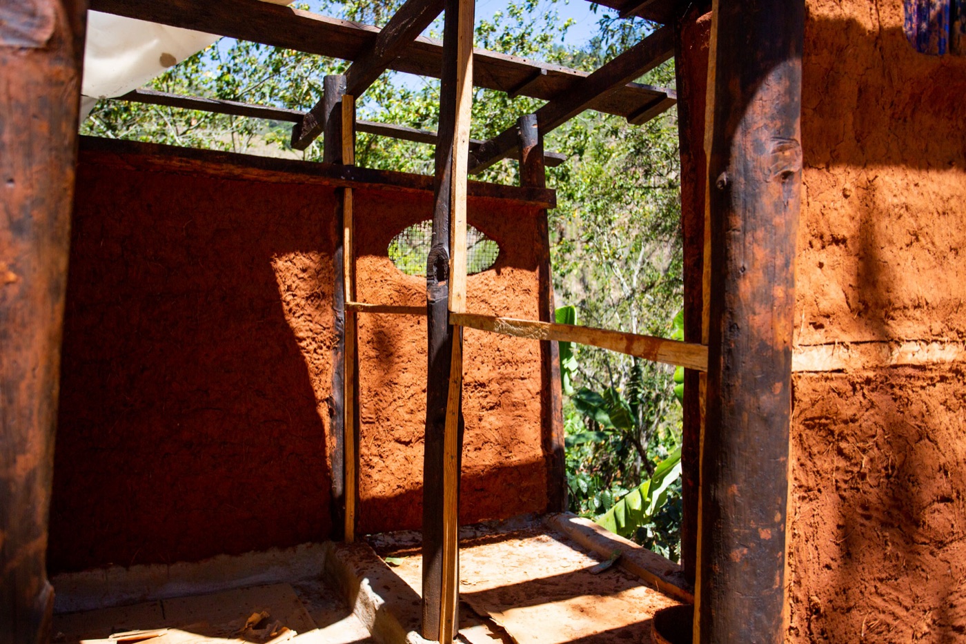 Plastering a quincha wall together